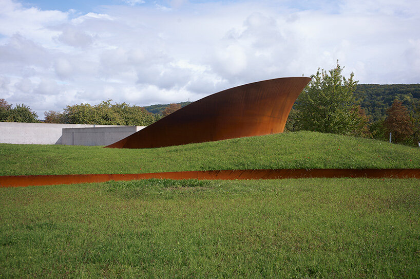 balkrishna doshi’s final project unfolds in spiraling steel forms on the vitra campus, germany