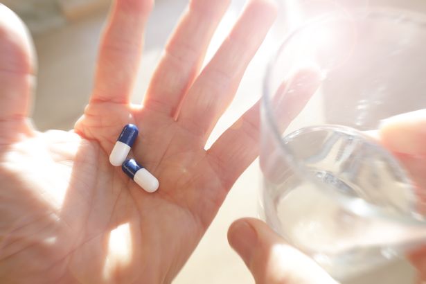 Person holding tablets