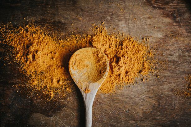 An urgent recall of turmeric powder, a spice often used in cooking, has been made due to the presence of salmonella - stock photo