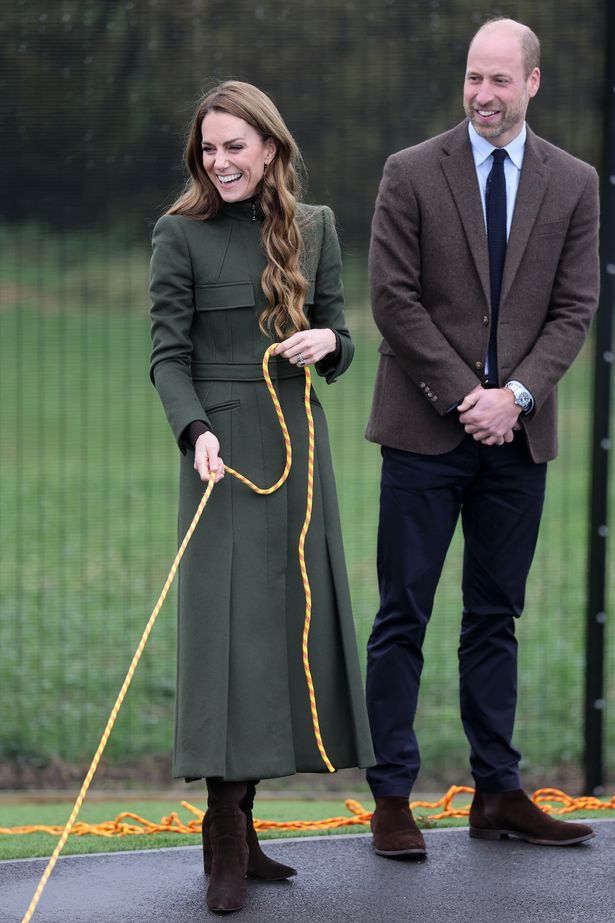 William and Kate help out during a training drill at the Northern Ireland Fire & Rescue Service's new training college in County Tyrone 