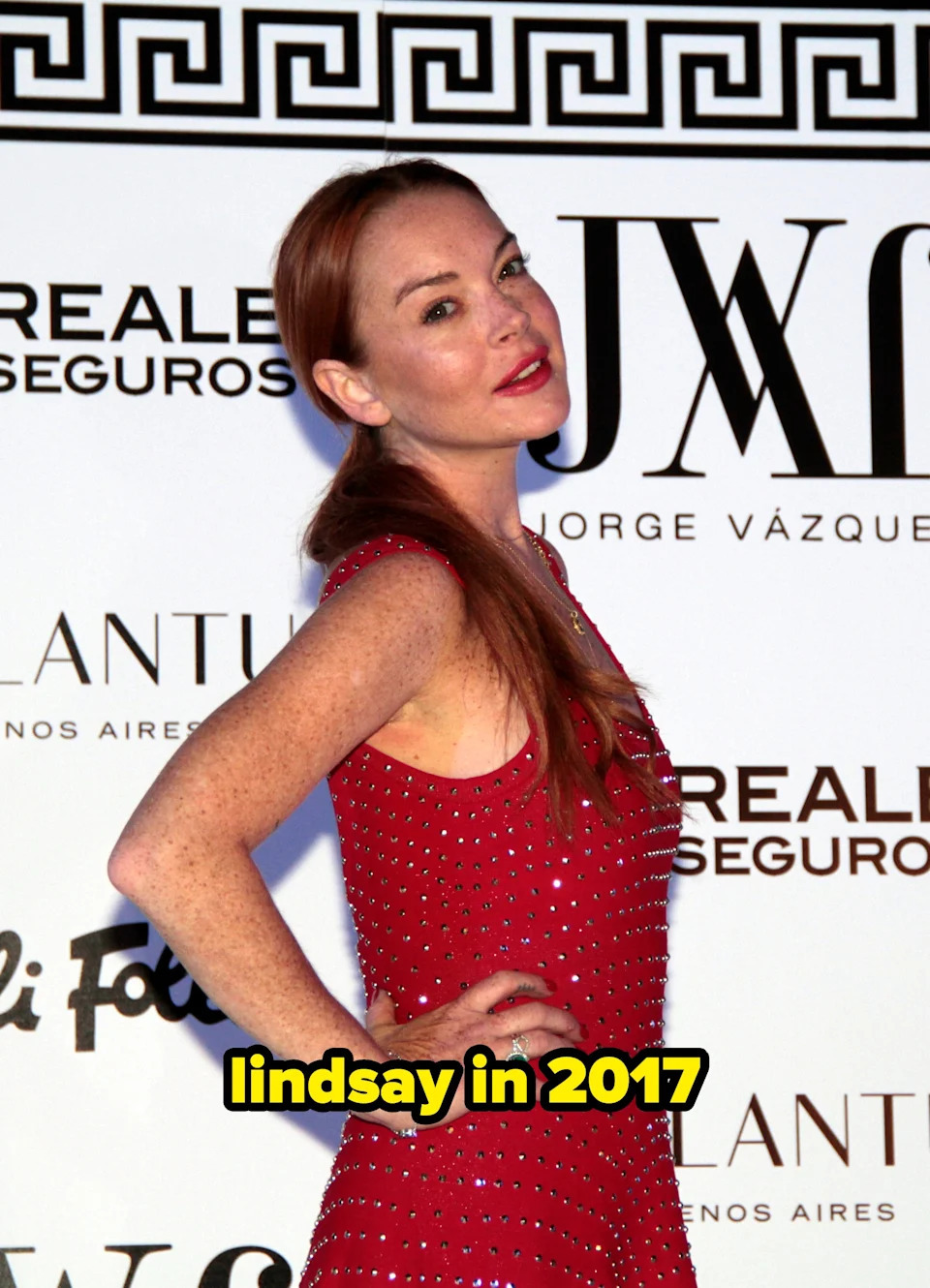 Lindsay Lohan posing on a red carpet