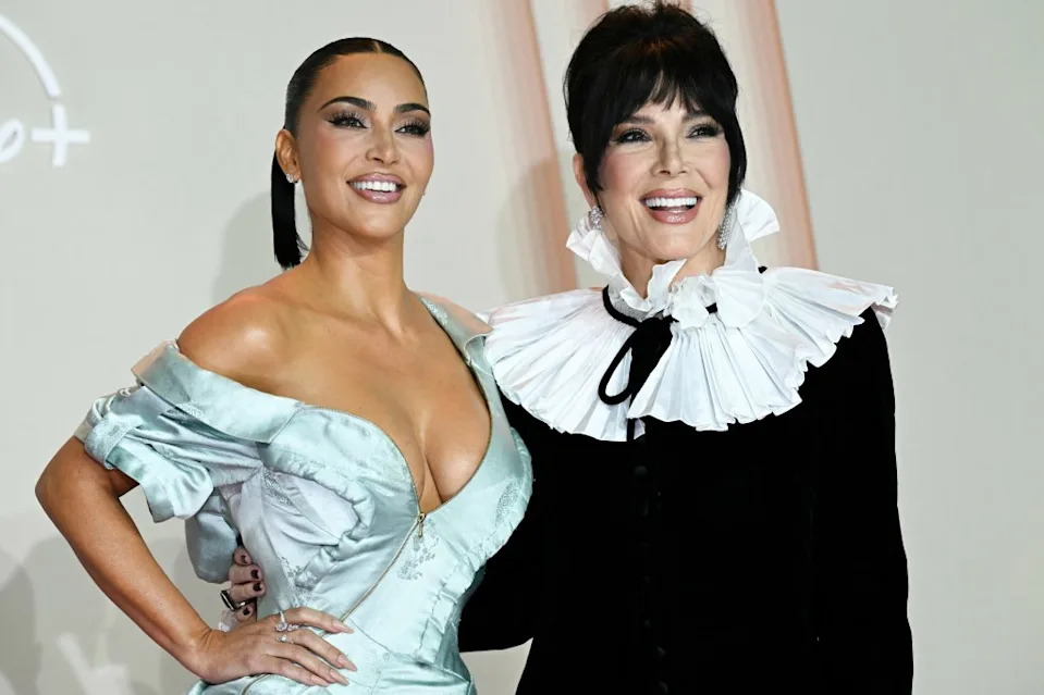Never one to forgo a photo op, Jenner accompanied her daughter on the red carpet. AFP via Getty Images