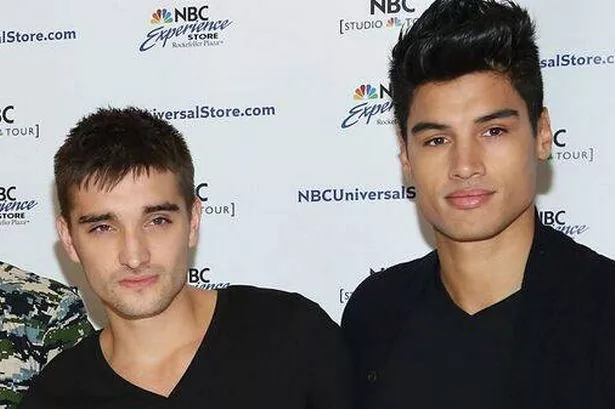 Tom Parker and Siva Kaneswaren standing beside each other