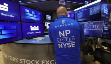 NEW YORK: A trader works on the floor of the New York Stock Exchange (NYSE) at the opening bell.-- AFP