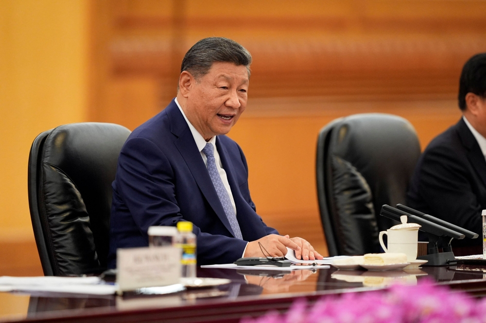 Chinese President Xi Jinping speaks during a meeting with Sri Lanka’s Prime Minister Harini Amarasuriya at the Great Hall of the People in Beijing, China, on October 14, 2025. — Reuters pic