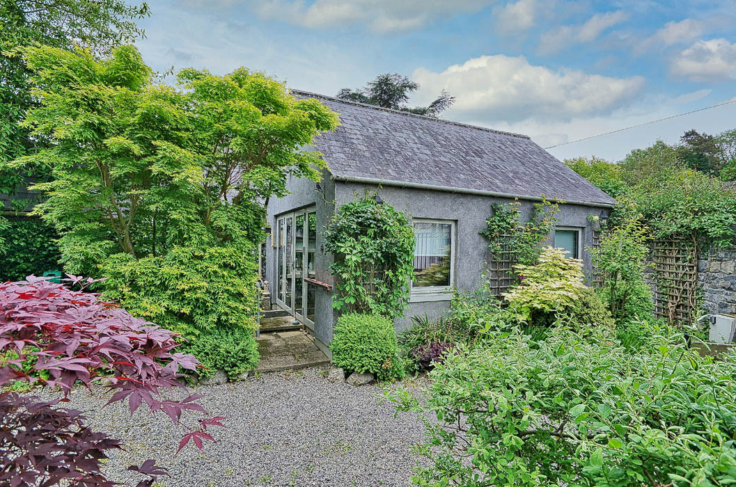 18km from Dublin, this urban gate lodge sits on 0.8 acres with a link to the Guinness family