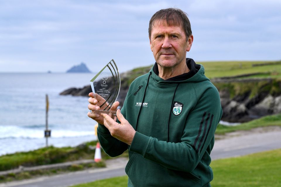 Kerry football manager Jack O’Connor with his GWA Gaelic Football Personality of the Year award in front of Skellig Michael at St Finian’s Bay in Ballinskelligs, ahead of tonight’s Gaelic Writers Association Awards, supported by Dalata Hotel Group. Photo: Brendan Moran/Sportsfile