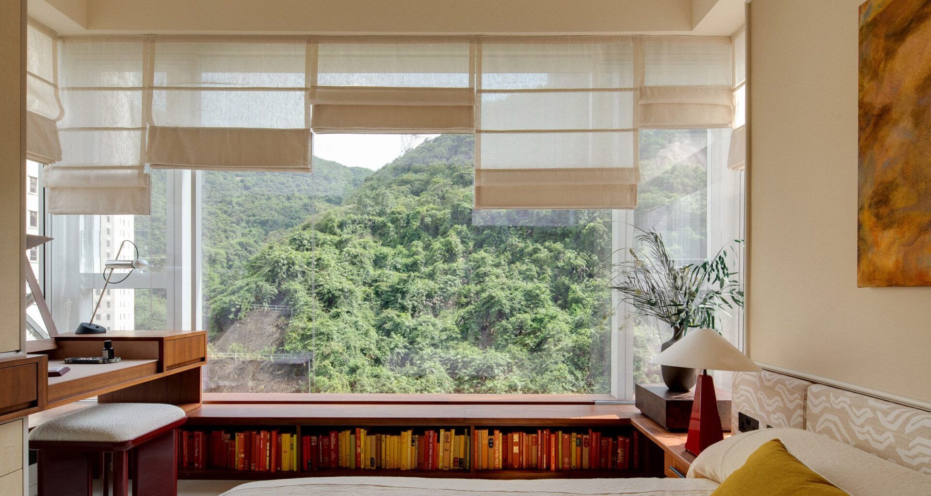 Hong Kong's lush hillsides inform model apartments by Studio Ella