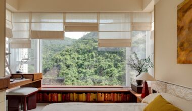 Hong Kong's lush hillsides inform model apartments by Studio Ella