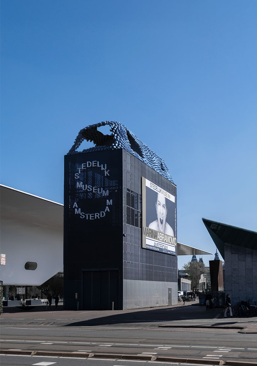recycled 3D printed rooftop homes explore adaptable urban living at 2025 venice biennale
