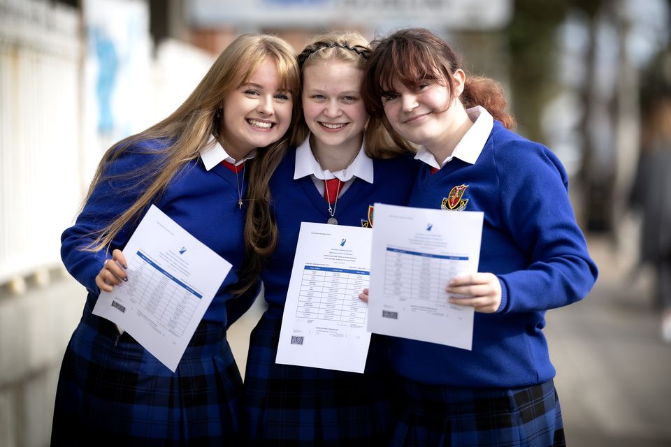 Molly Devlin, Issey Conachy and Katy Geoghegan, from St Vincent's Secondary School, Dundalk, Co Louth, celebrate after receiving their Junior Cycle results