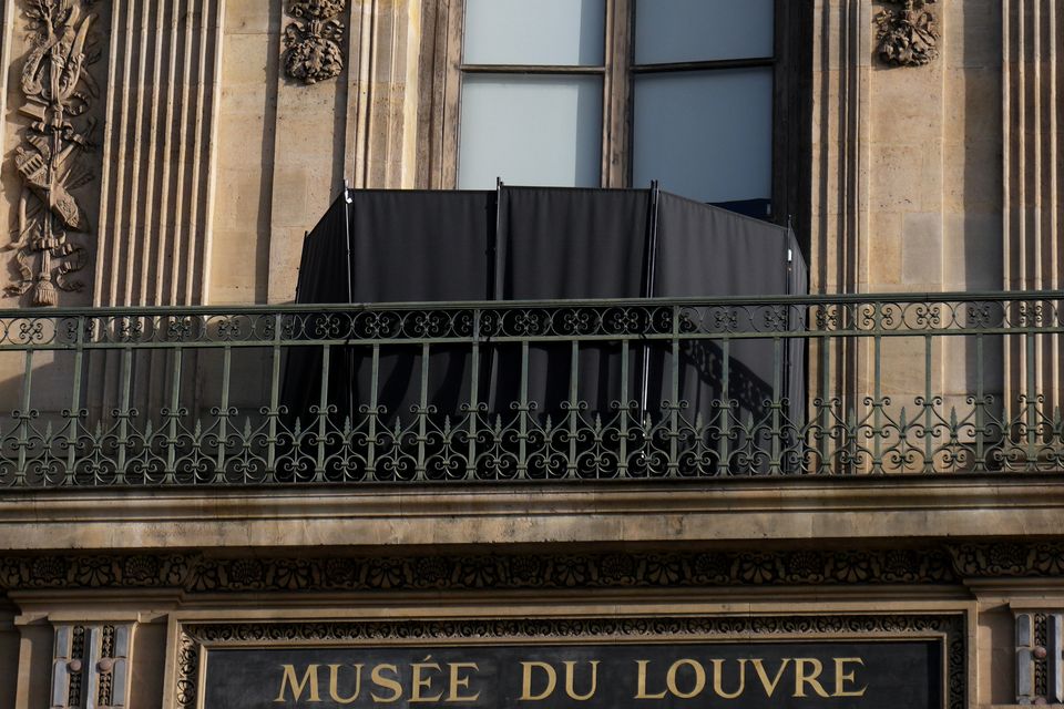 A black curtain covers the window where thieves entered the site. Photo: Thibault Camus/AP