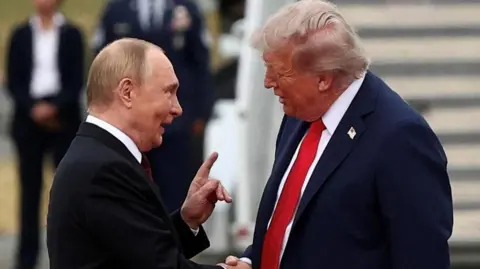 Reuters U.S. President Donald Trump shakes hand with Russian President Vladimir Putin, as they meet to negotiate for an end to the war in Ukraine, at Joint Base Elmendorf-Richardson in Anchorage, Alaska,