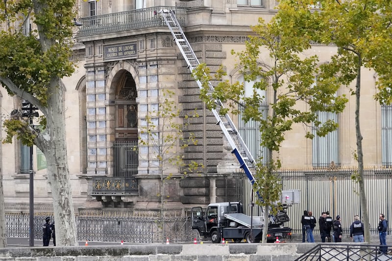 Thieves used an extendable ladder to access the museum’s Seine-facing facade and forced entry through a window. Photograph: Thibault Camus/AP