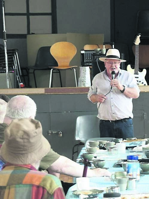 Pat ‘The Hat’ Speight entertains a gathering at the Shandon Men’s shed in 2022