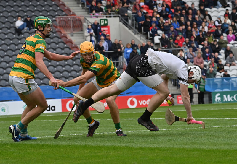  Blackrock's David O'Farrell and Michael O'Halloran putting pressure on Midleton keeper Bríon Saunderson. Pic: Dan Linehan.