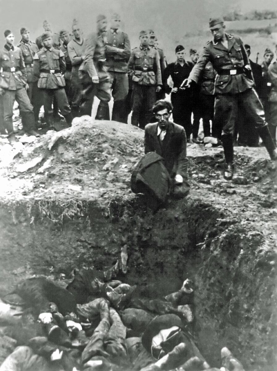 The photo of the German soldier about to shoot one man during the massacre was long incorrectly captioned 'The last Jew in Vinnitsa'. A key step in Jürgen Matthäus's research was establishing that the murder took place 90km away in Berdychiv. Picture: Galerie Bilderwelt/Getty
