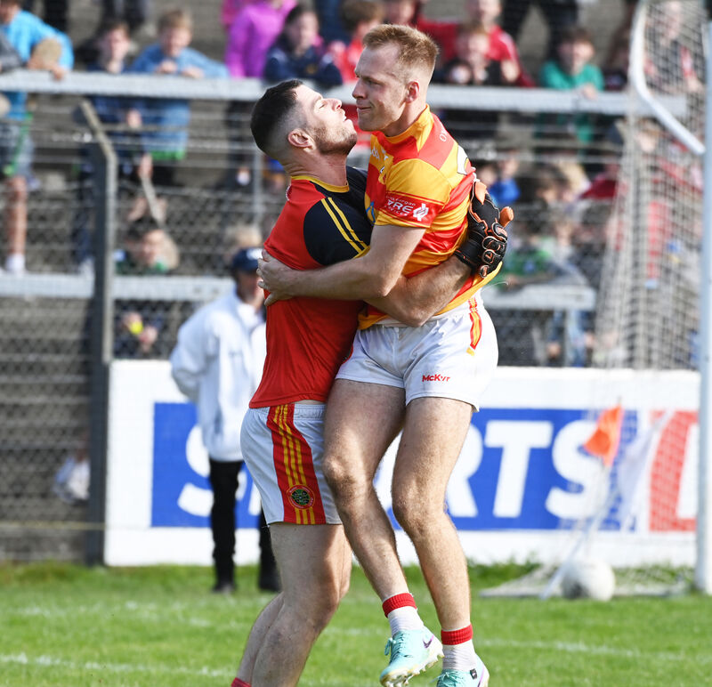 Luke Meade celebrates with Newcestown goalkeeper Christopher White after the McCarthy Insurance Group Premier SFC quarter-final win over Carrigaline. Picture: Eddie O'Hare