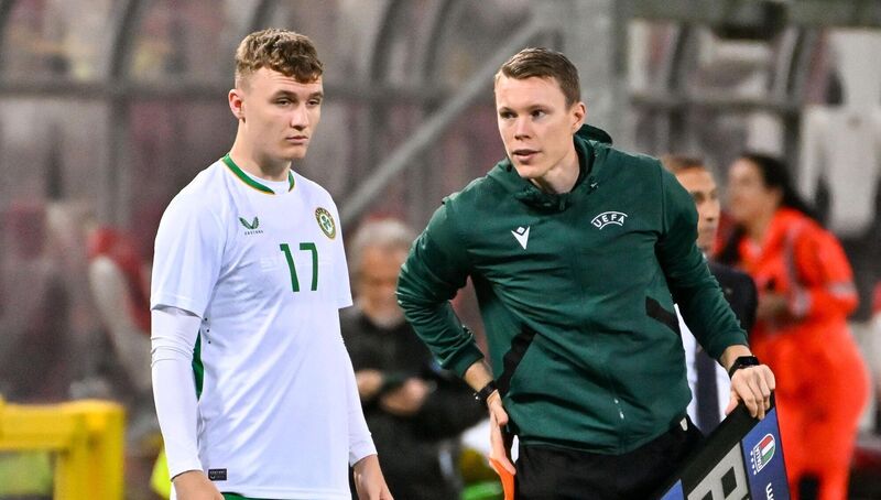 Mark O'Mahony of Republic of Ireland prepares to come on as a substitute during the UEFA European U21 Championship qualifier match between Italy and Republic of Ireland at Stadio Nereo Rocco in Trieste, Italy. Photo by Igor Kupljenik/Sportsfile