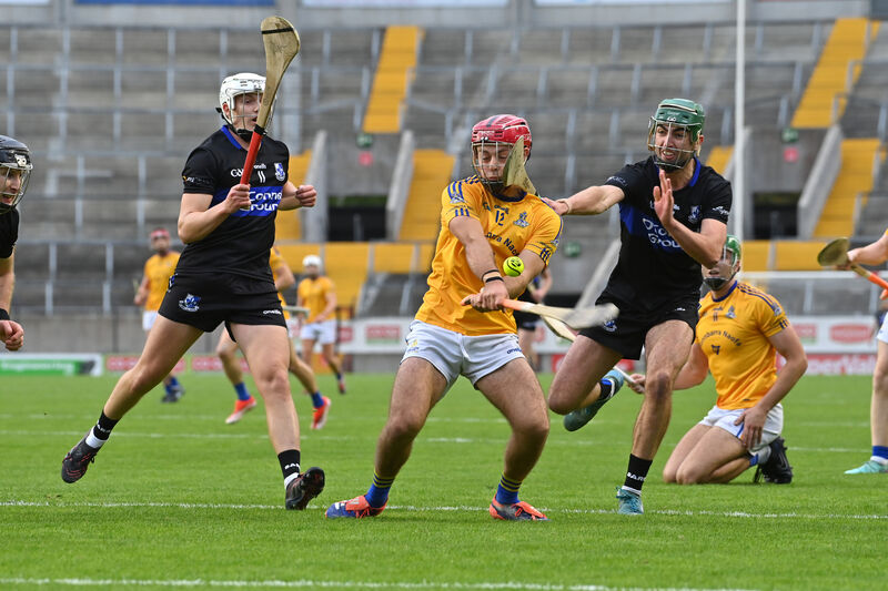  Sarsfields players Colm McCarthy and Cillian Roche looking to block the shot of William Buckley, St Finbarr's. Picture: Dan Linehan
