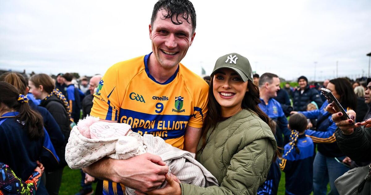 New dad Adam Flanagan celebrates with cup