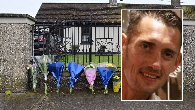 Flowers at the residence on Rockview Terrace, Doneraile, Co Cork, where the body of postman Barry Daly was discovered on Sunday morning. Picture: Dan Linehan