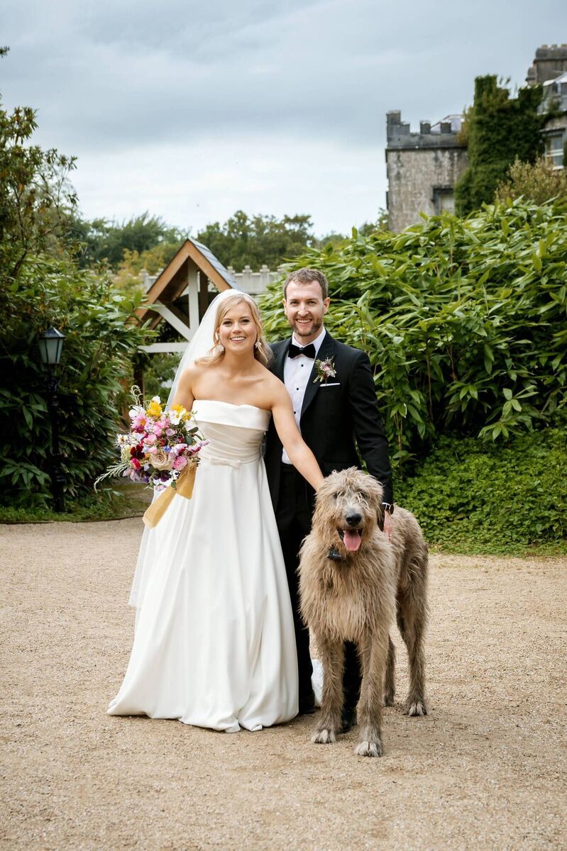 Niamh O'Connor and Reuben O'Hea with Dolan, the newest wolfhound pup in Ballyseede Castle. Pictures: Janusz Trzesicki Photography 