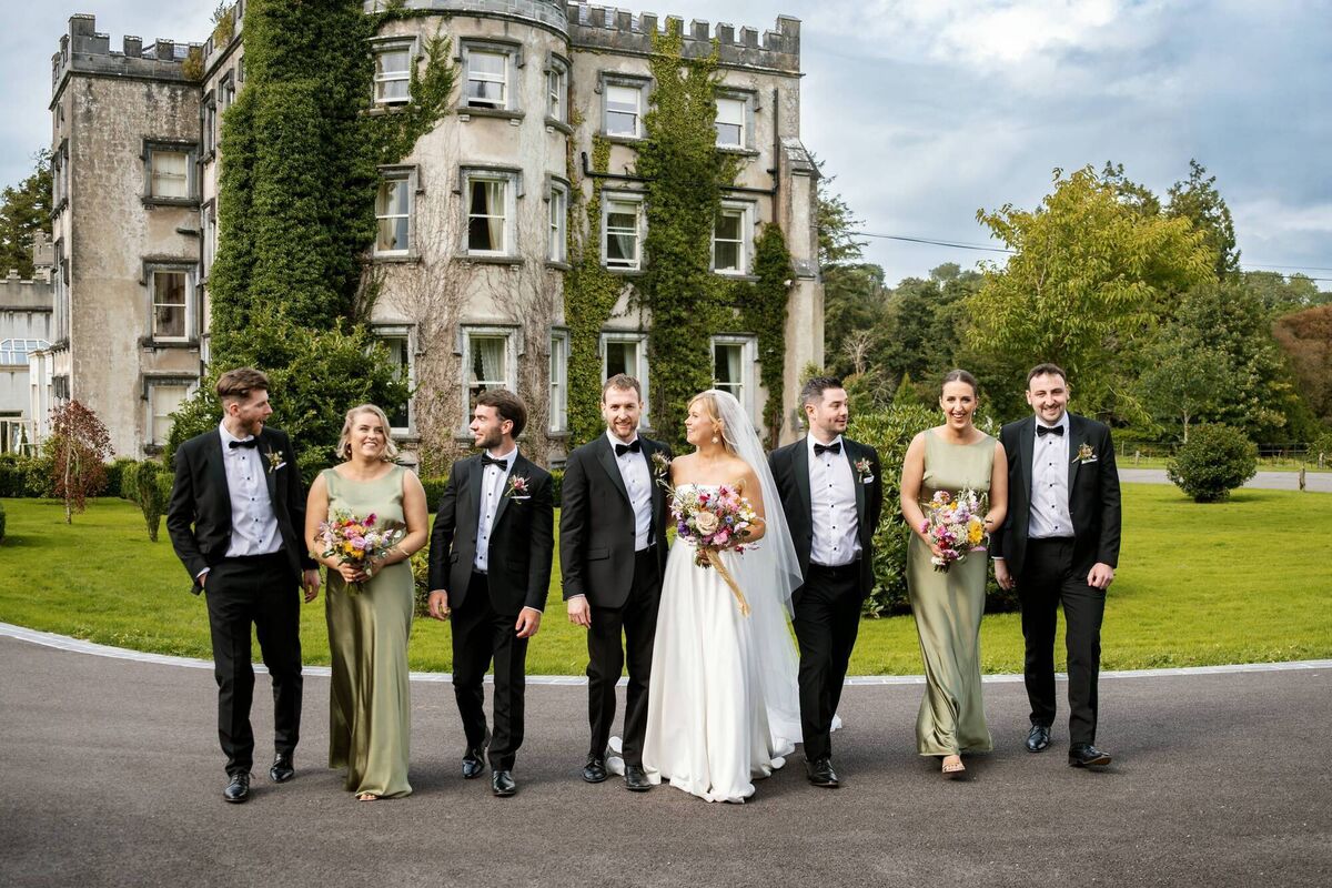 Niamh O’Connor and Reuben O’Hea with their wedding party. Pictures: Janusz Trzesicki Photography