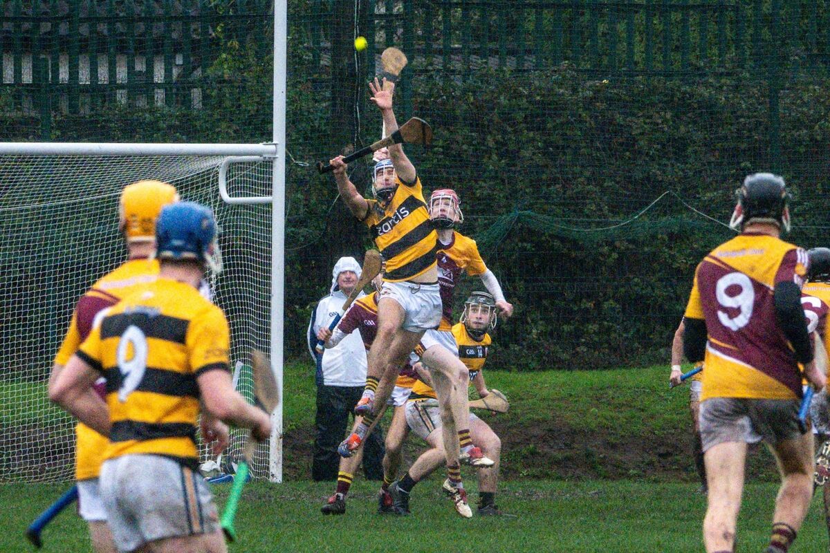 Na Piarsaigh’s Jack Scanlon leaps high to gain possession against Whitechurch. Picture: Chani Anderson.