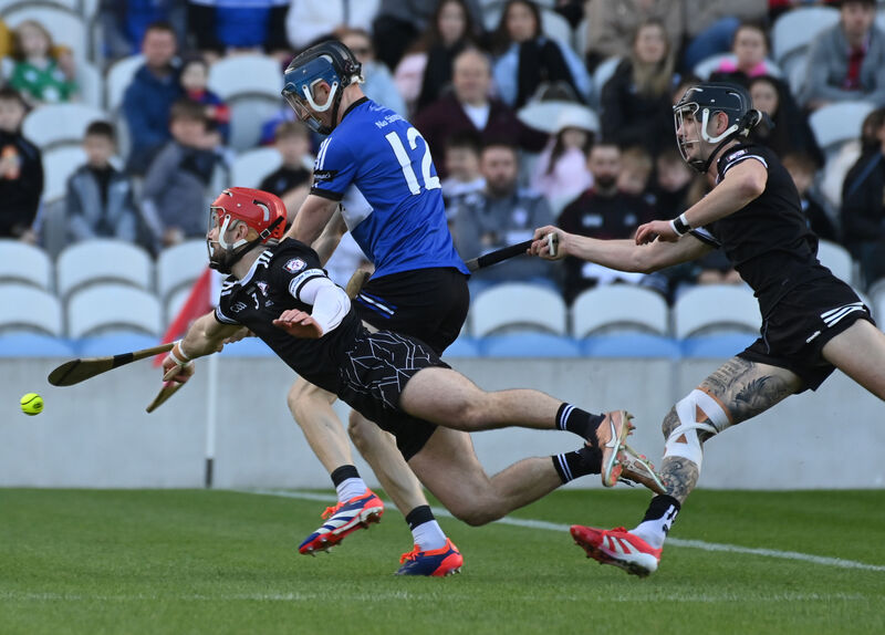  Sarsfields' Cian Darcy shoots from Midleton's Séadhnaidh Smyth. Picture: Eddie O'Hare