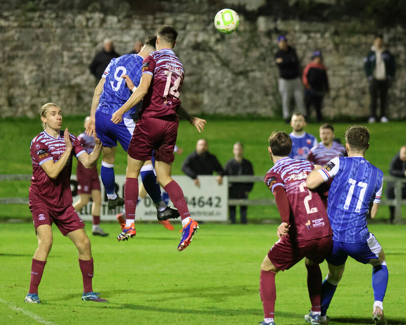 Patrick Ferry, Treaty United, and Cian Coleman, Cobh Ramblers, rise high for possession. Picture: Brendan Gleeson