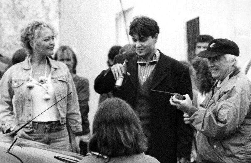 Angeline Ball, Johnny Depp, and director Thom Eberhardt taking a break during the filming of 'Divine Rapture' in Ballycotton, Co Cork in July, 1995. Picture: Ted McCarthy/Irish Examiner Archive