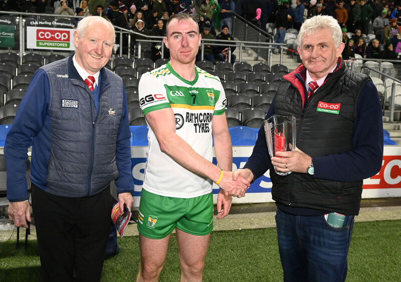 Dermot Foley of Co-op SuperStores presents the man of the match award to Bride Rovers' Shane O'Connor. Also pictured is Cork County Board chairperson Pat Horgan. Picture: Eddie O'Hare