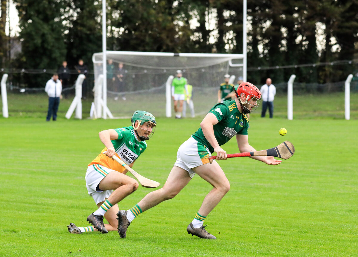 Cobh's George Keating breaks away from Bride Rovers' Ryan Prendergast. Picture: David Creedon
