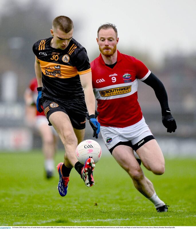 Dingle's veteran midfielder Billy O'Connor pursues Dylan Casey of Austin Stacks in Sunday's Kerry SFC final. The Dingle man had a fine county final. Pic: Brendan Moran/Sportsfile