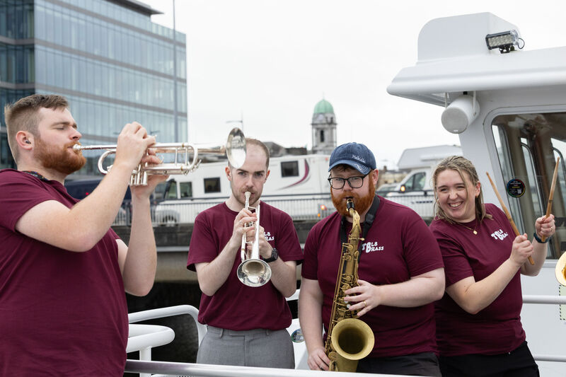TBL8 Brass performing onboard Cork Harbour Cruises during the Guinness Cork Jazz Festival. 