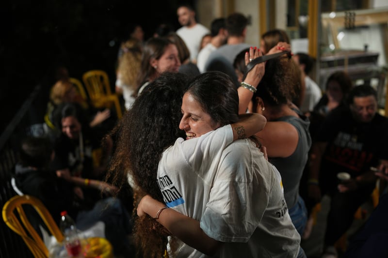 Relatives and supporters of Israeli hostages held by Hamas in the Gaza Strip celebrate after the announcement that Israel and Hamas have agreed to the first phase of a peace plan. Photograph: Emilio Morenatti/AP