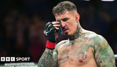 Tom Aspinall holds his hurt eye at UFC 321