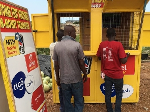 A photo of MoMo agent serving customers A photo of MoMo agent serving customers
