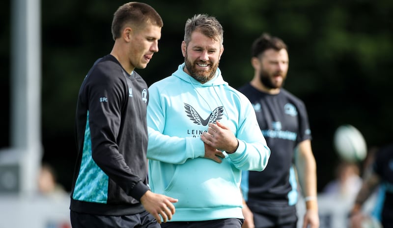 Leinster's Sam Prendergast (left) with coach Seán O'Brien during a training session last month. Photograph: Nick Elliott/Inpho