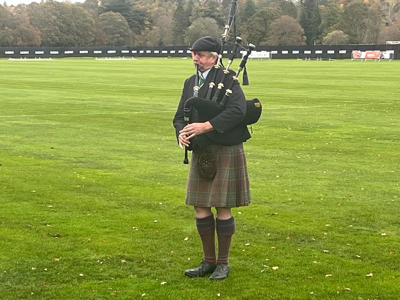 Lone bagpiper Duncan Mcgillivray plays a tune by Watery Willie on the field at Bught Park in Inverness