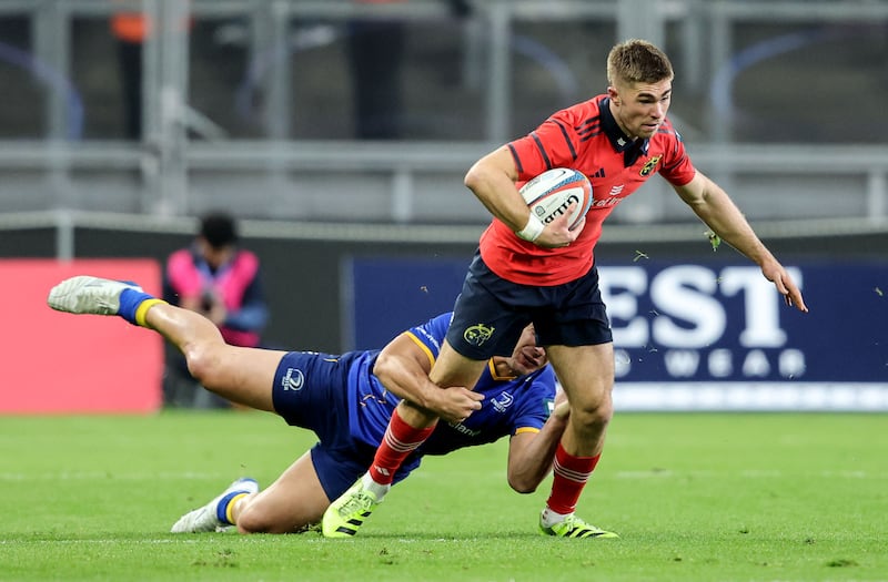 Munster's Jack Crowley is tackled by Leinster's James Lowe at Croke Park last Saturday. Photograph: Dan Sheridan/Inpho