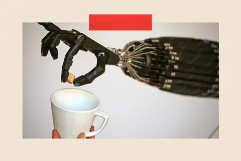 Getty Images A dextrous hand robot putting a sugar cube into a mug
