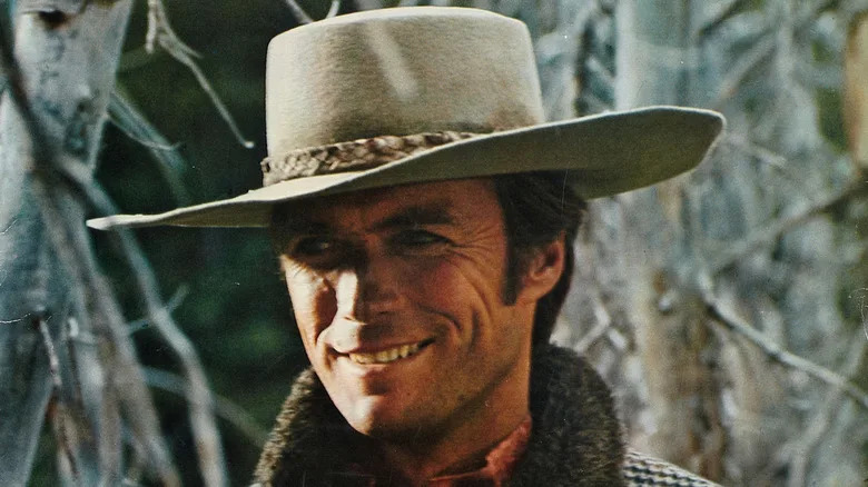 Pardner (Clint Eastwood) smiles in the woods in Paint Your Wagon