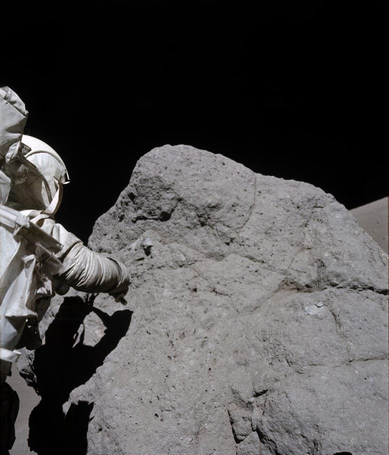 Apollo 17 Astronaut Sampling Boulder at Station 7