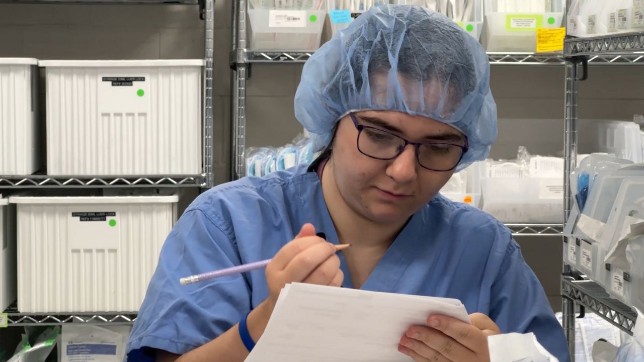 Brooklin Califano works as a Surgical Supply Tech at Orlando Health Jewett Orthopedic Institute. (Spectrum News/Jeff Allen)