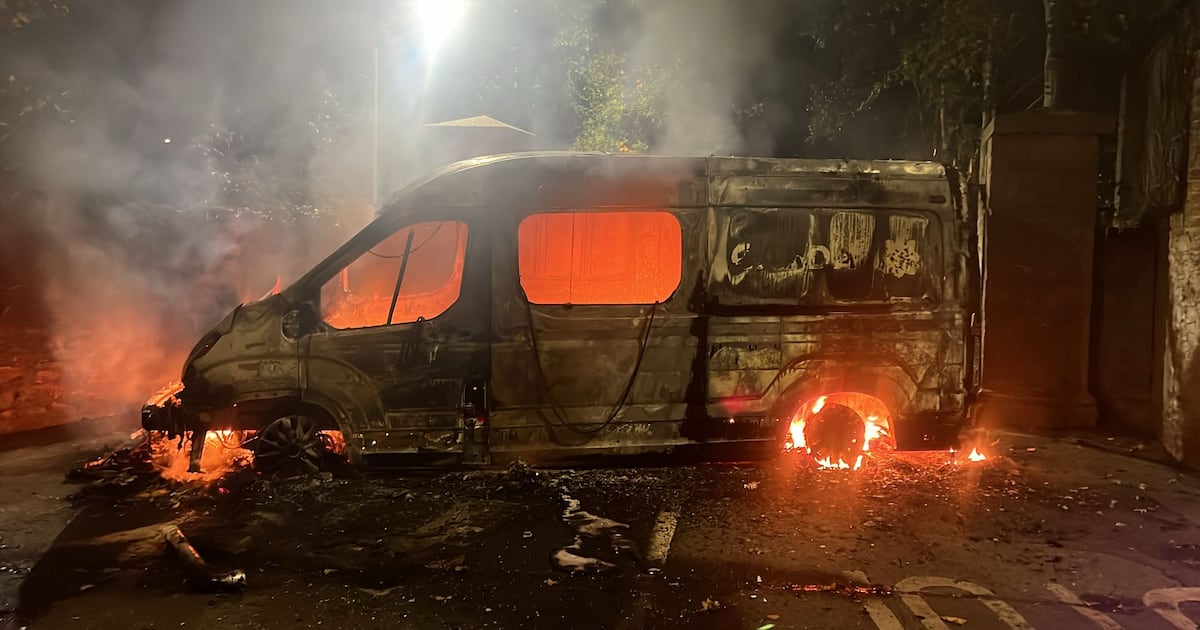 ‘Hold your ground’: Six arrested as garda van burned and fireworks launched at officers at Citywest Hotel - The Irish Times