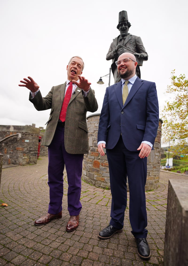 Reform UK leader Nigel Farage with his party's candidate Llyr Powell. Photograph: Ben Birchall/PA