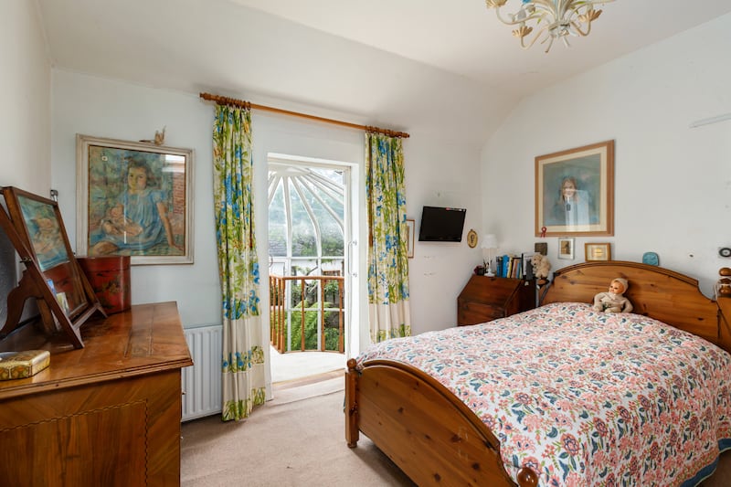 Bedroom opens on to conservatory balcony