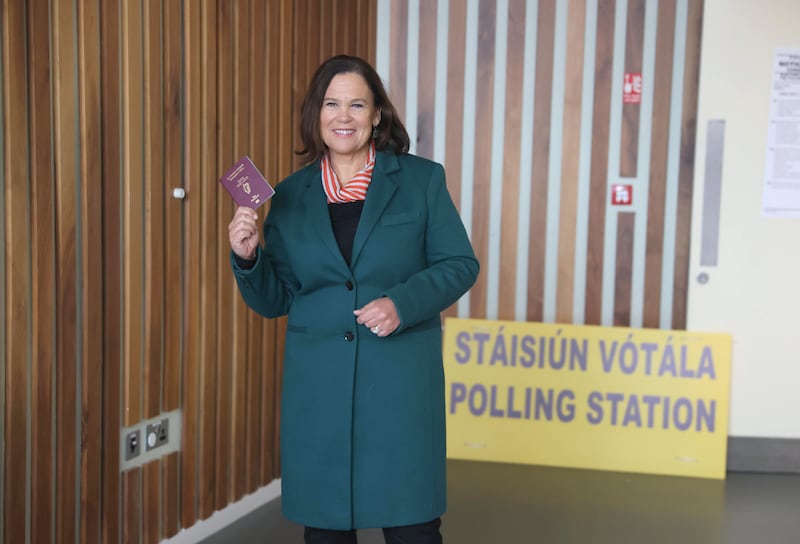 Ms McDonald had her passport on hand (voters can bring ID instead of their polling card, if needed). Photograph: Liam McBurney/PA Wire